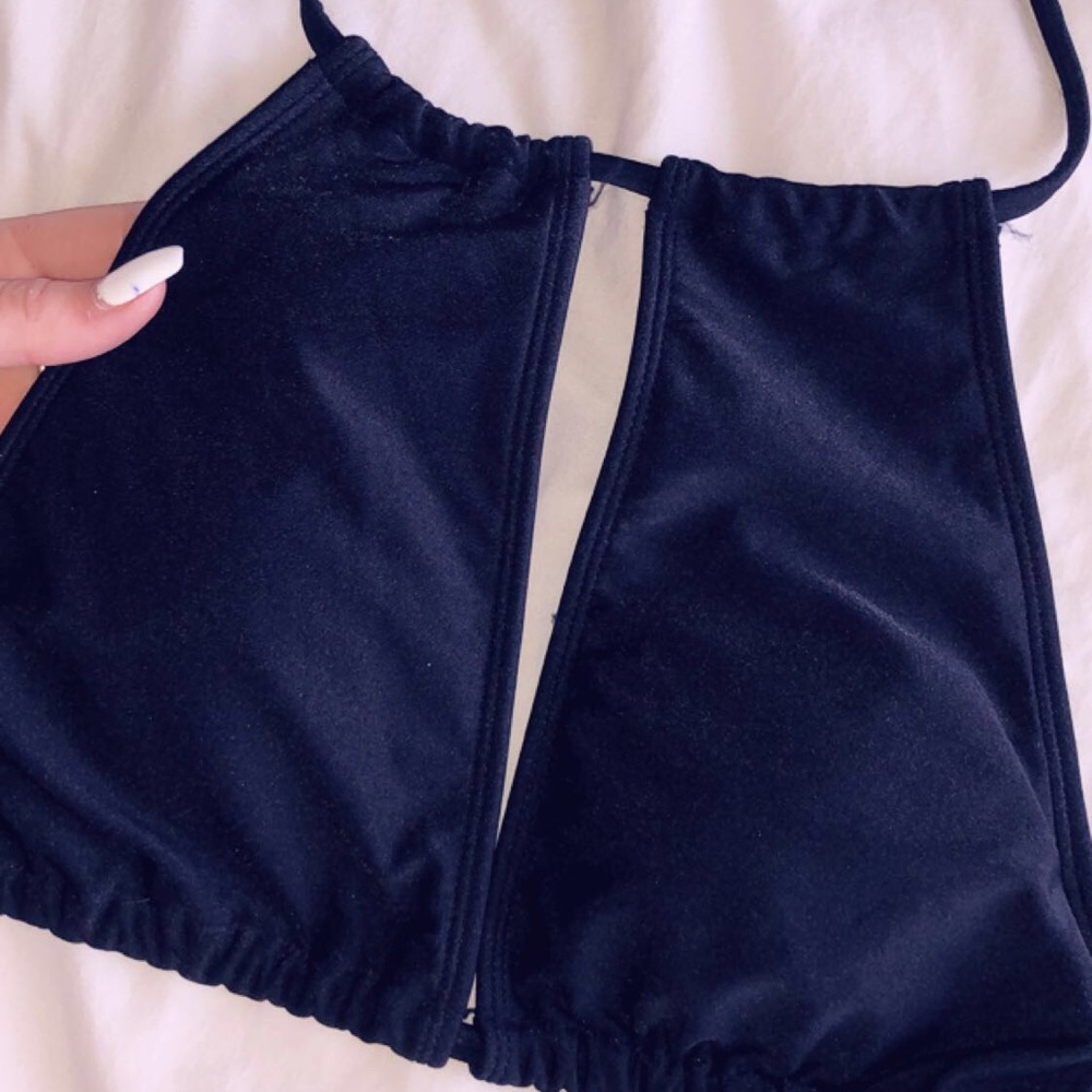 Black halter bikini top with slit